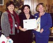Photo: Maria accepting teaching award